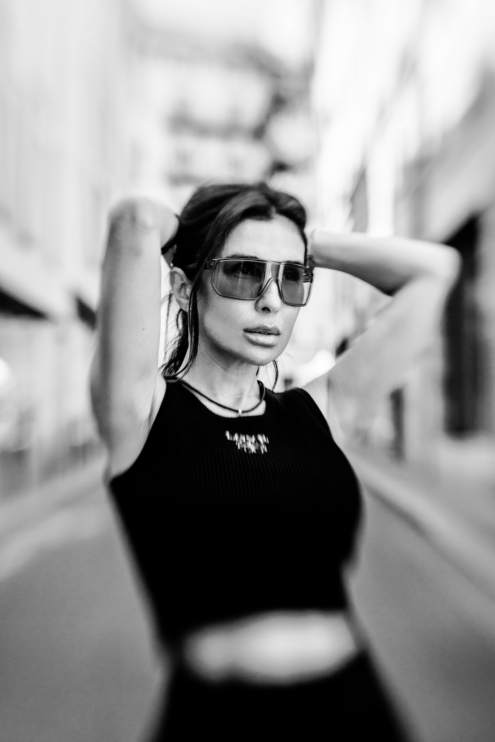 Shana Mak in a street, arm raised